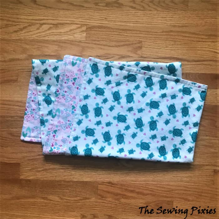 Follow my free tutorial on how to sew a baby blanket using flanner fabric! It makes perfect handmade new baby gift!