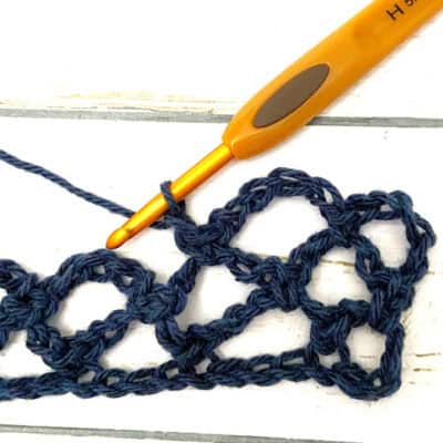 Learn a basic trellis crochet sttich and use it for a fishing net wall decoration crochet pattern! It is a perfect sttich for a lacy crochet pattern ideas!