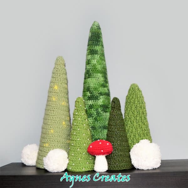 Learn how to crochet a Christmas cone tree decoration! Includes free pattern!