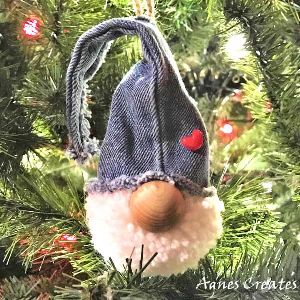 Reuse old jeans into Christmas ornaments! Follow my free tutorial on how to make gnome ornament! Free gnome sewing pattern included!