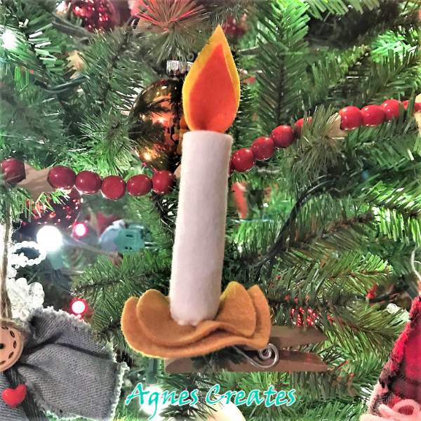 Follow my free tutorial and learn how to make a felt candle ornament! Free candle templets!