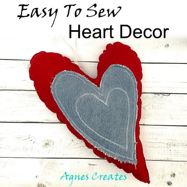 Get a handmade Valentine's Day decor idea! Follow a free fabric heart sewing pattern and make a Valentine's Day decor!