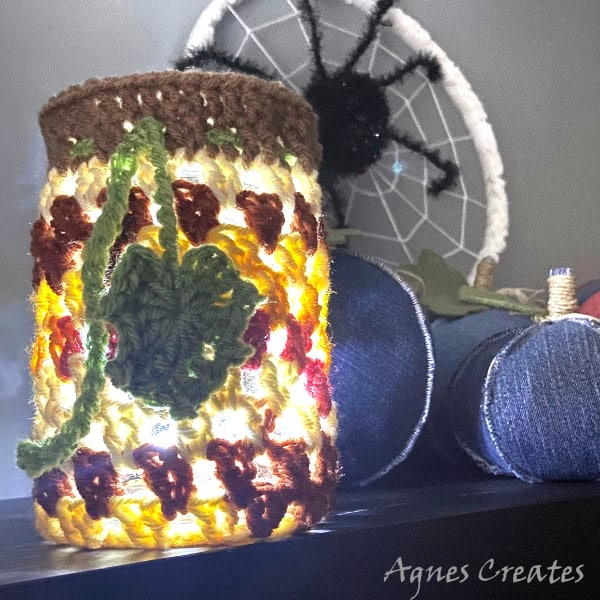 Learn how to crochet a pumpkin luminary to decorate your home this fall. Follow my glass jar pumpkin cover crochet pattern to crochet a fall decoration for your home!