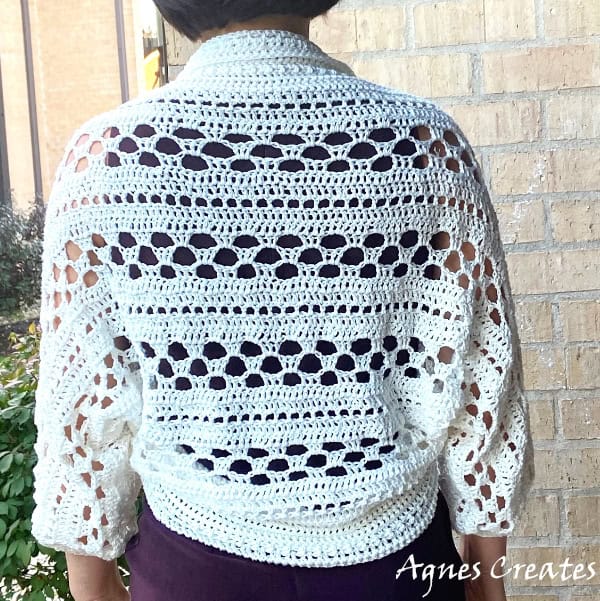 Learn how to crochet a lacy cover up for your dress. Follow my free lacy shrug crochet pattern! 