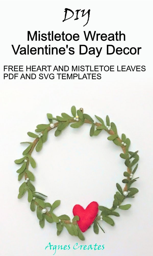 DIY Valentine's Day decor idea! Learn how to make a mistletoe wreath using felt! Free heart template. 