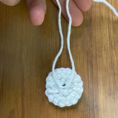 Learn how to crochet an eye for an owl crochet pattern!