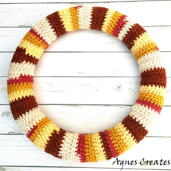 Follow my free pumpkin crochet pattern and learn how to crochet a styrofoam cover! It makes a perfect crochet wreath base for home decoration!