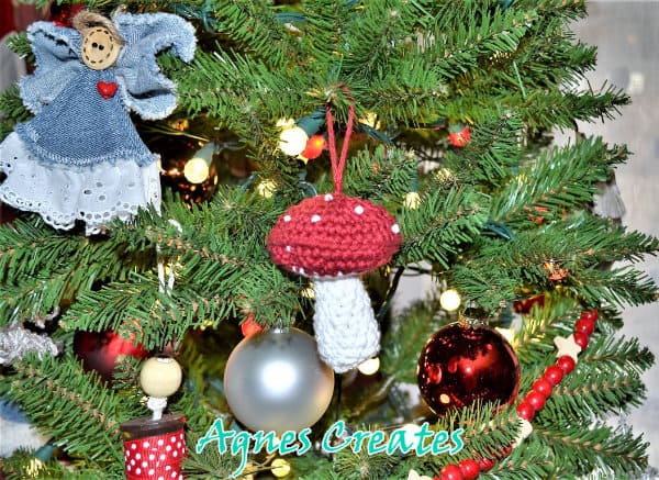 Learn how to crochet a mushroom ornament to decorate your home for Christmas! Includes free crochet pattern! 